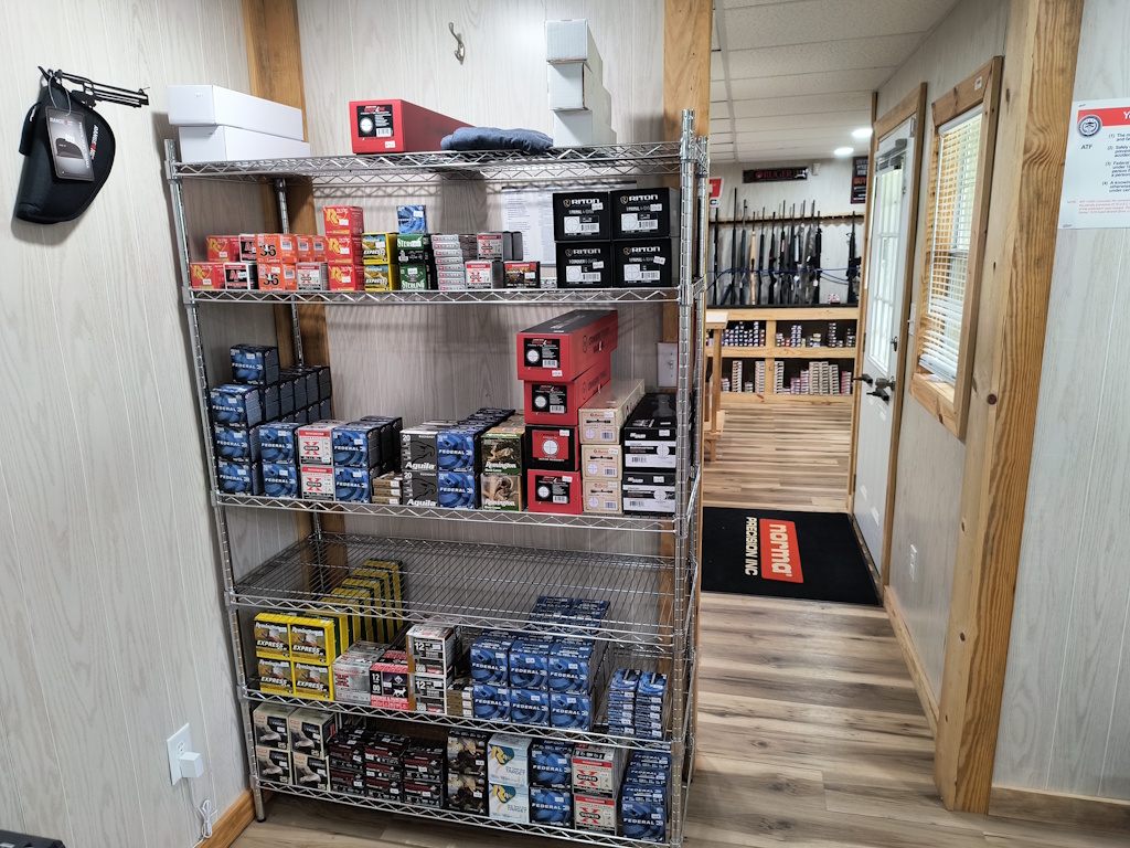 Askew Arms display rack showcasing ammunition